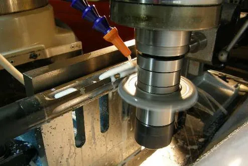 Barrel being fluted on the milling machine