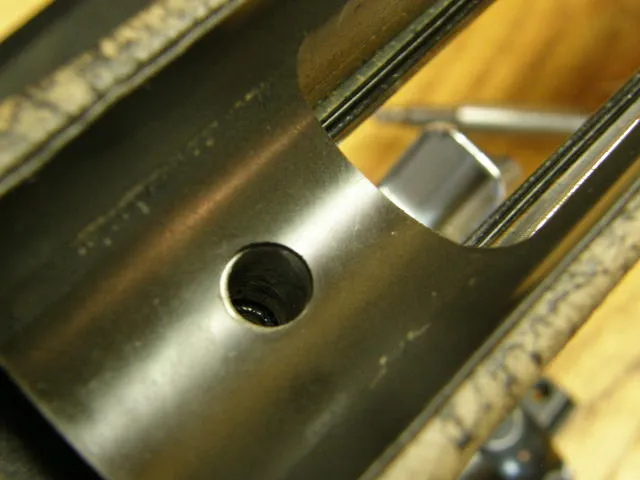 Inside of a stock showing the aluminum bedding block contact points