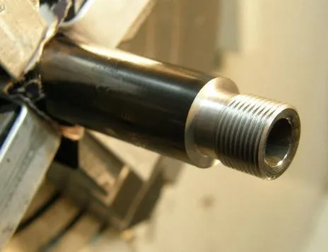 Barrel muzzle threaded for a brake